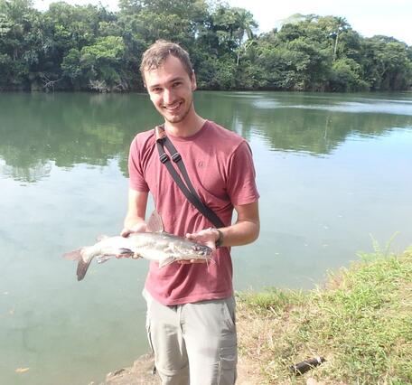 Luke holding a Mayan catfish on the Sittee River in Belize.