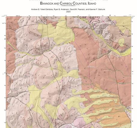 Geologic map in varying shades of pink, orange and yellow depicting different rock units in the Bear Camp Gulch Quadrangle; text at the bottom of map and index map for location within the state of Idaho. 