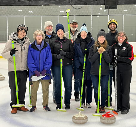USGS colleagues and friends on the ice at a rink following a class.