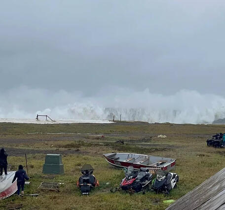 Residents in Nome, Alaska watch storm waves from Typhoon Merbok