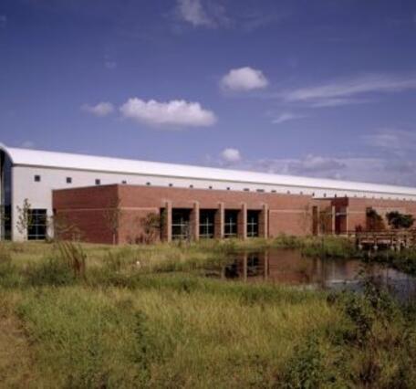 image shows the National Wetland and Aquatic Research Center when it was newly built in 1992