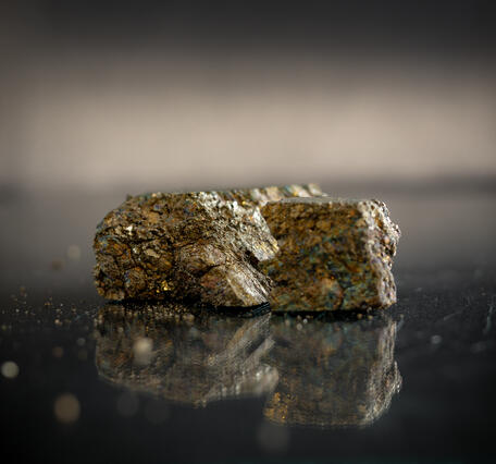 High-definition image showing metallic texture and layered structure.