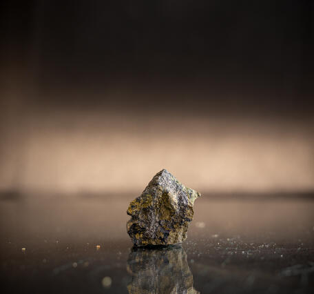 High-definition image of covellite with pyrite, showing the deep blue iridescence of covellite.