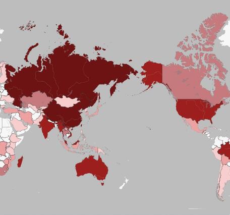 A world map with countries shaded in red tones to represent involvement in critical mineral resources.