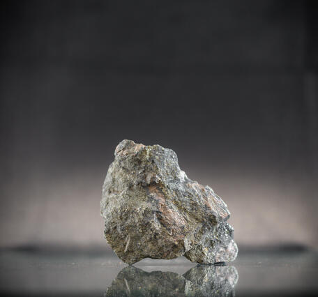 USGS mineral specimen featuring gold ore with pyrrhotite, galena, sphalerite, and pyrite.