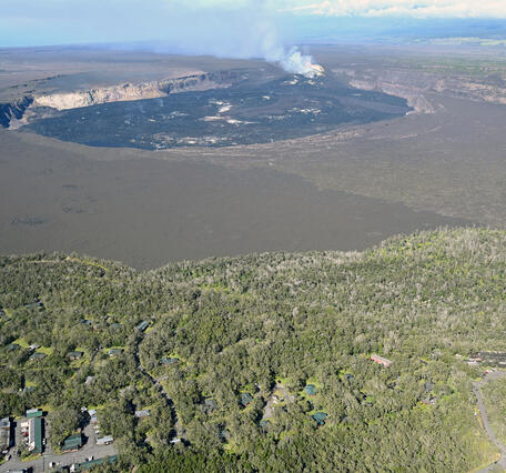 Color photograph of caldera at summit of volcano