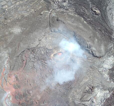 Color photograph of lava within volcanic vent