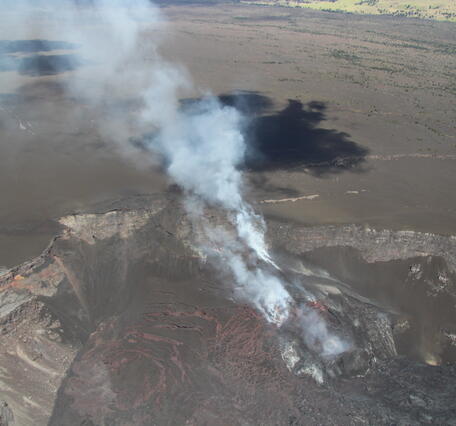 Color photograph of volcanic vent degassing