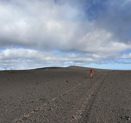 Color photograph of volcanic material deposited on landscape