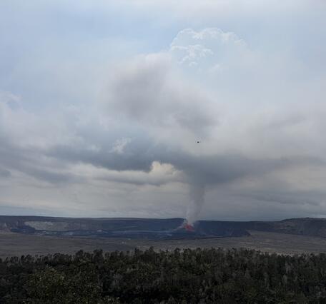 Color photograph of eruption plume