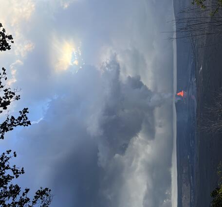 Color photograph of lava fountaining within a caldera