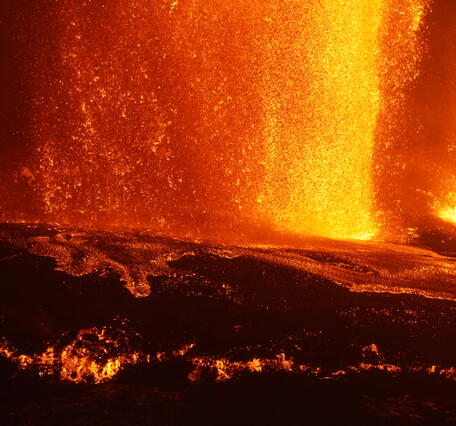 Color telephoto of lava flows at base of lava fountain