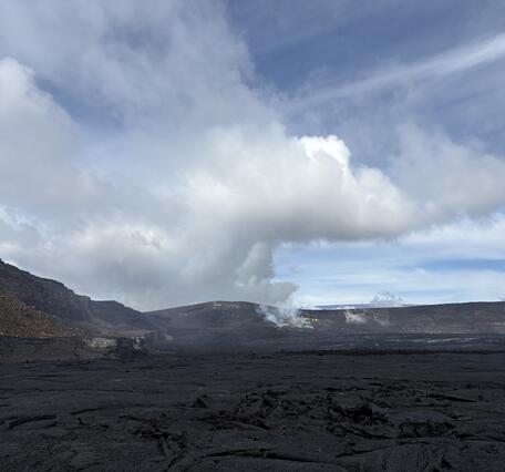Color photograph of volcanic vent degassing