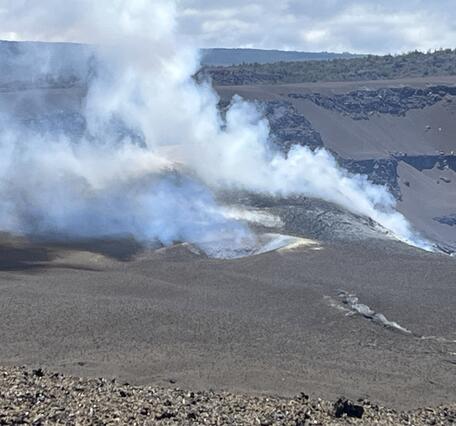 Color photograph of volcanic vents degassing