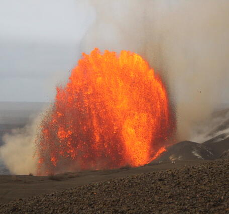 Color photograph of lava fountain during the daytime