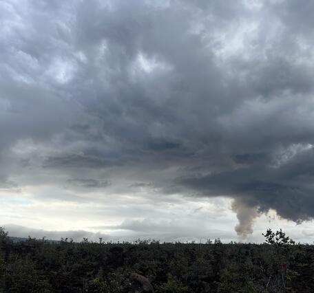 Color photograph of volcanic plume
