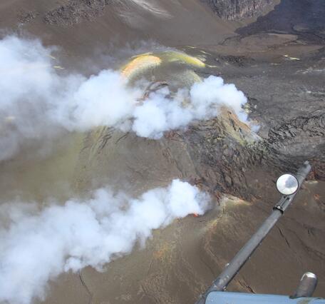 Color photograph of active degassing volcanic vents