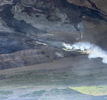Color photograph of degassing volcanic vents