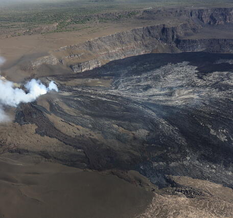 Color photograph of volcanic vents degassing