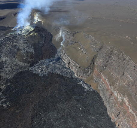 Color photograph of volcanic vents degassing