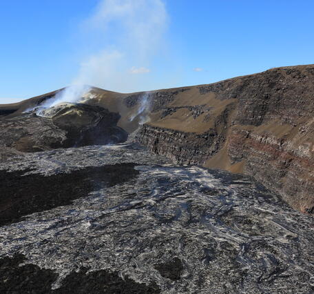 Color photograph of volcanic vents and crater wall