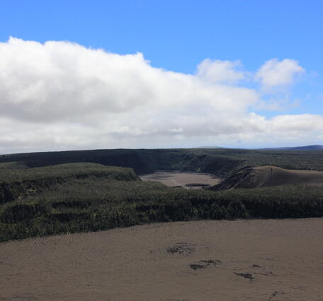 Color photograph of volcanic cone and crater
