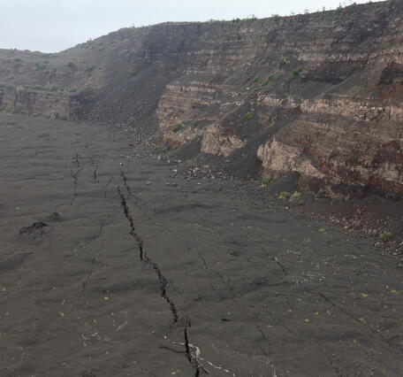 Color photograph of caldera wall and floor