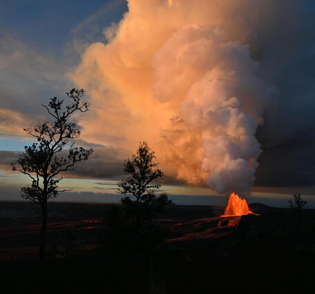 Color photograph of lava fountain and eruptive plume