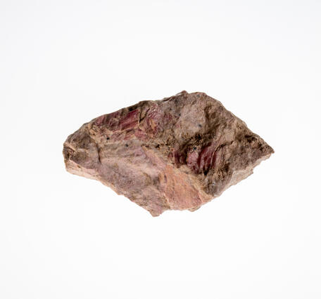 Isolated rhodonite specimen from the USGS mineral collection.