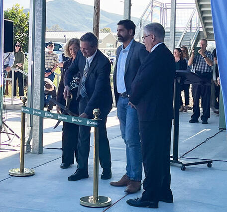 Ribbon cutting by Jim Dunning, Associate Executive Director of Cal Poly Partners. 