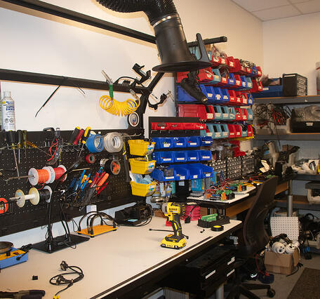 Shop adjacent to the boat warehouse where members of the Projects Office team discuss their workload.