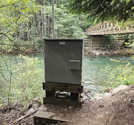 Metal box on side of river