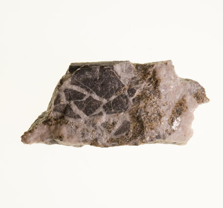High-definition image of sphalerite specimen with visible crystal faces and reddish-brown hue.