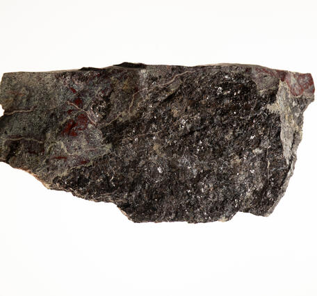 Isolated specimen of sphalerite with serpentine.