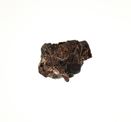High-definition image of wolframite specimen with granular texture and black coloration.