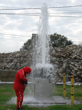 Scientist working at well