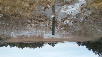 Well Pipe in frozen marshland