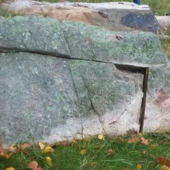 A large fracture in a granite rock. 