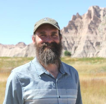 Portrait of Gregor Schuurman in Badlands National Park.