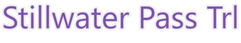 A purple text string with an off-white halo identifying a snow trail.