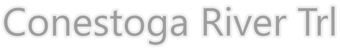 A gray text string with an off-white halo identifying a water trail.