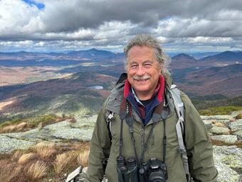 Stephen Jackson on the summit of Wright Peak in the Adirondack Mountains