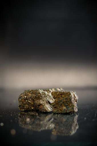 High-definition image showing metallic texture and layered structure.