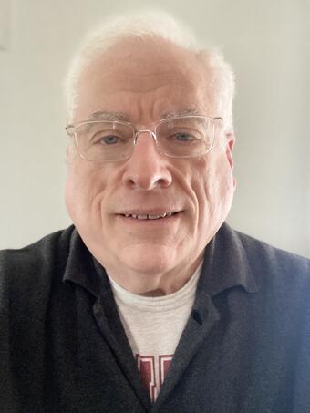 TNMCorps volunteer MRWert513 wearing glasses and a collared shirt.&nbsp;