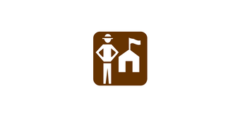 Ranger and building on top of a brown background.