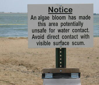 Marion Reservoir, Kansas, with a posted advisory warning