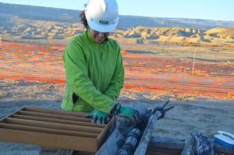 CRC geologist packing core samples.