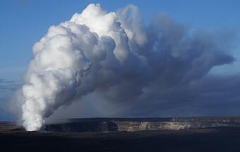 Color photograph showing emissions from volcanic vent