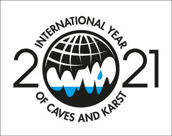 2021, with the 0 replaced by a globe. International Year of Caves and Karst along the outside border of the globe.