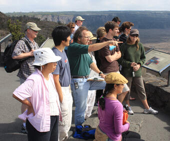 HVO gas geochemist explains features of Kīlauea volcano to visitors...